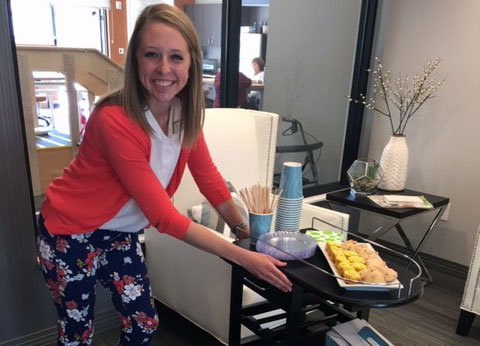 Our very own Hannah delivering an unexpected moment of delight for our guests: fresh scones & hot coffee.